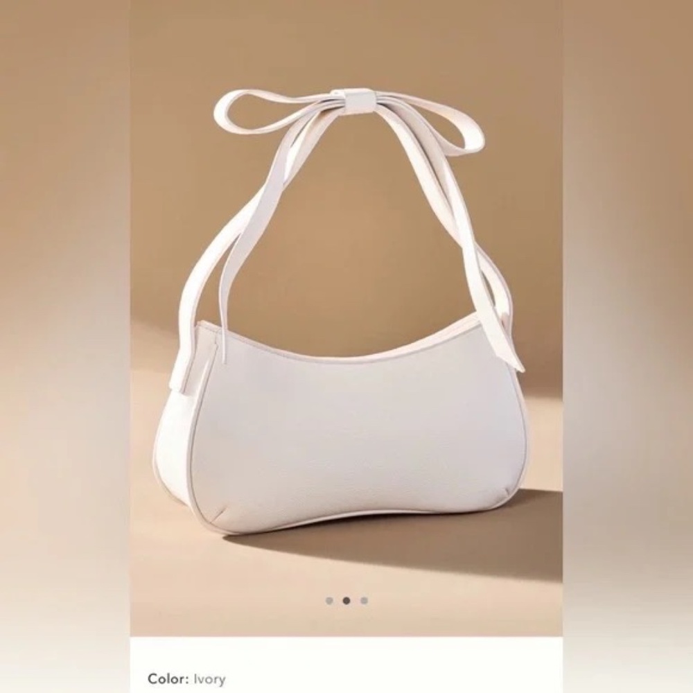 Anthropologie Ivory Bow Shoulder Bag